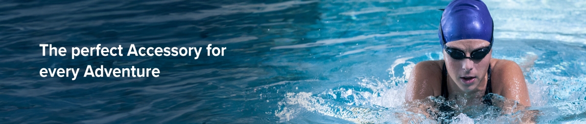 A girl wearing swimming goggles with the caption The perfect accessory for every adventure