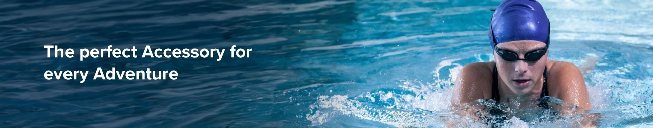 A girl wearing swimming goggles with the caption The perfect accessory for every adventure